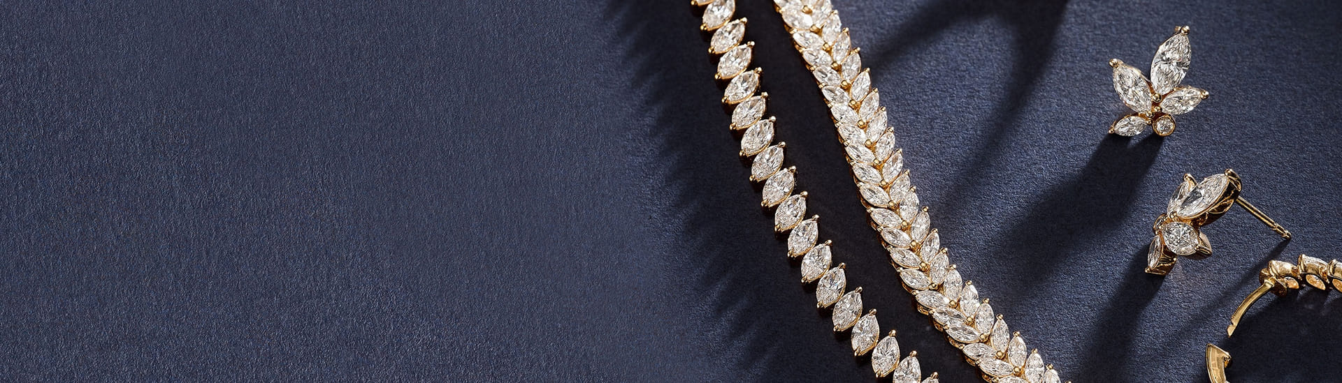 Marquise cut diamond jewelry in yellow gold